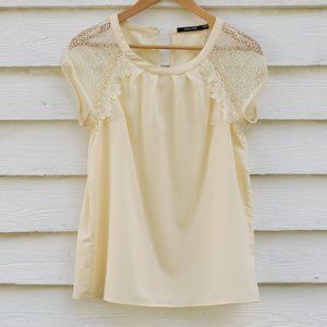 Fancy cream blouse with embroidered cap sleeves